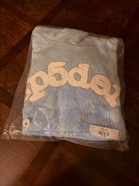 Light Blue Graphic Hoodie with White Appliqué Sp5der hoodie